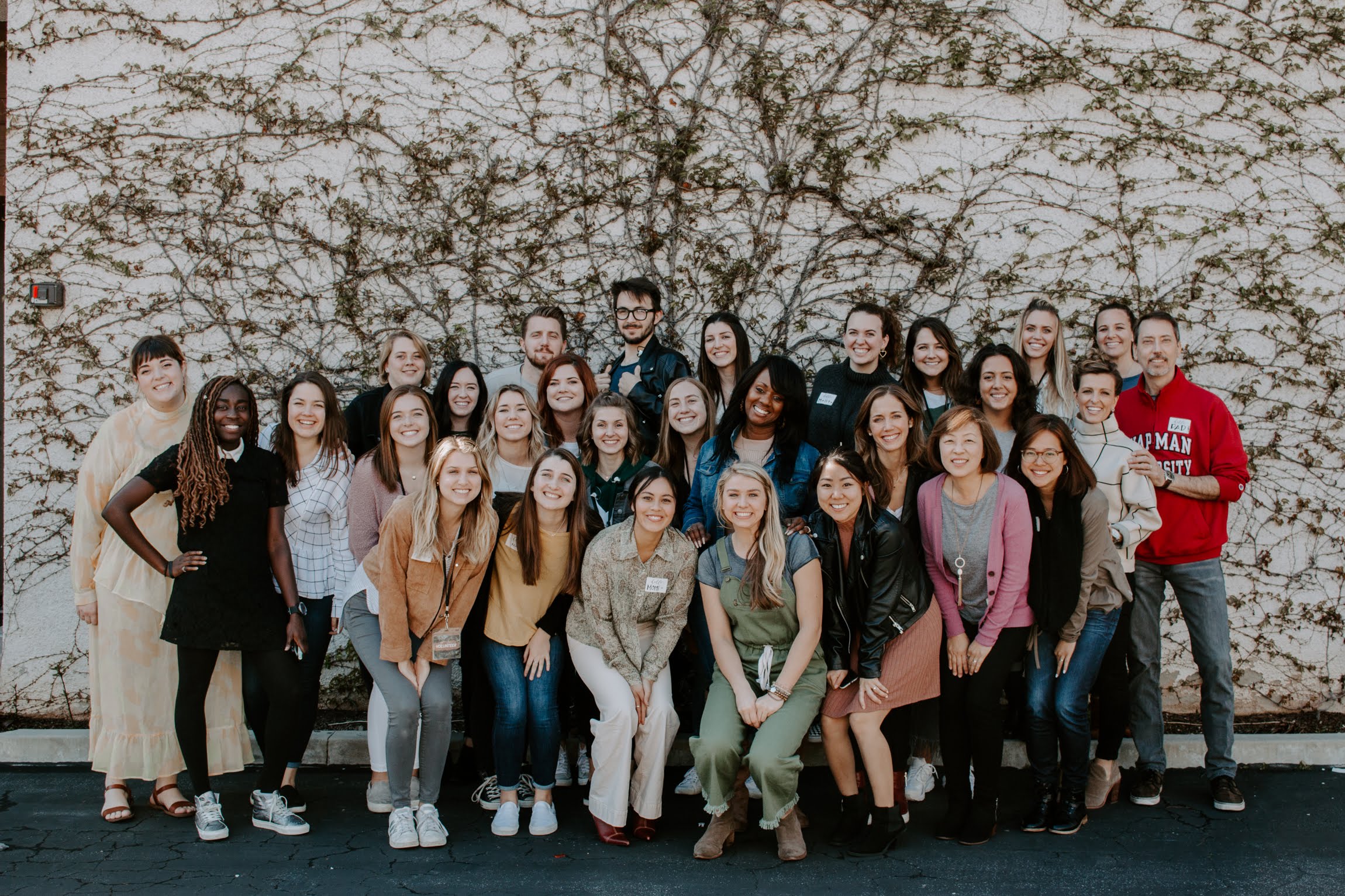 Women pose for a group photo at the Live Salted, Even When Conference in Los Angeles, California.