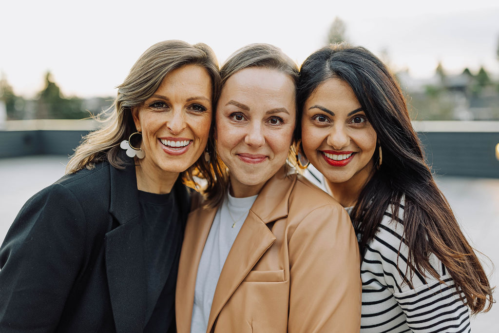 Three woman in the Live Salted ministry within the Greater Seattle area smile for the camera.